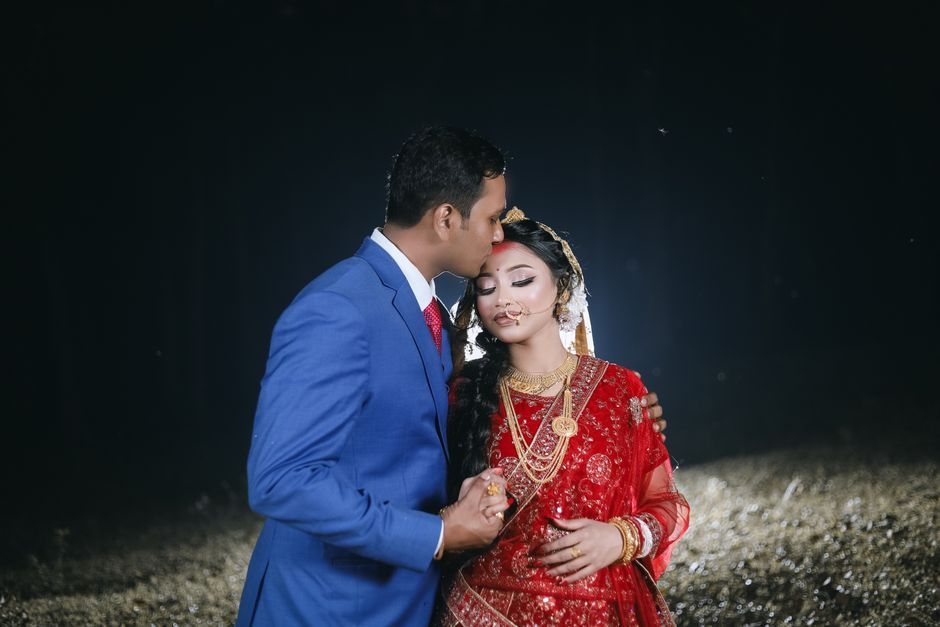 A beautiful portrait of an Indian bride and groom sh